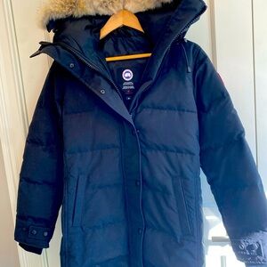 Never worn Canadian Goose down long winter parka with fur hood
